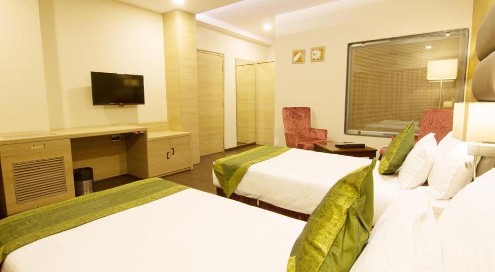 Kc Manor Hotel จัมเชดปูร์ ภายนอก รูปภาพ